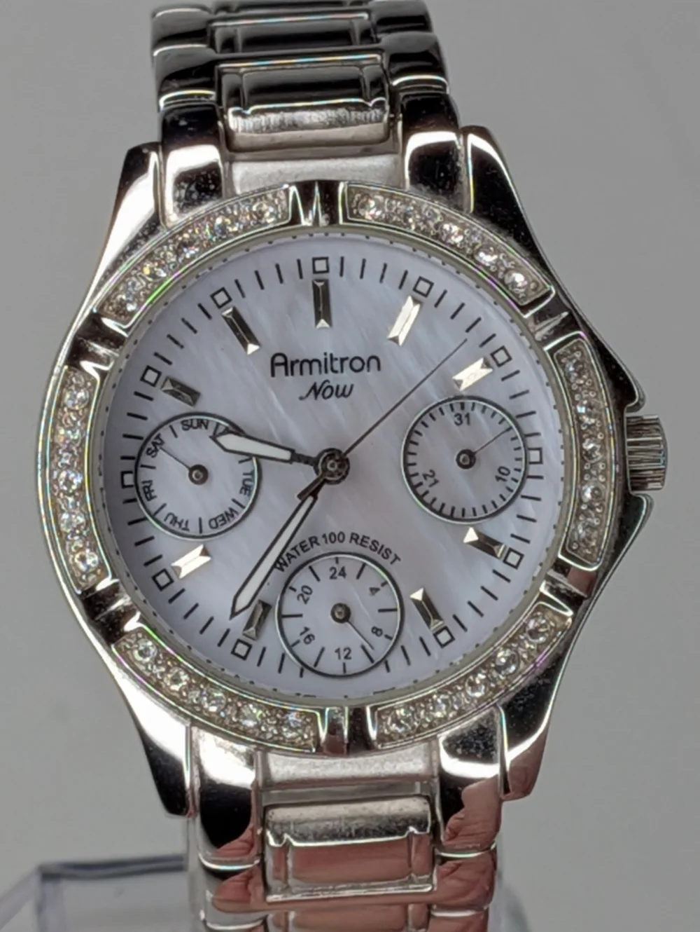 Armitron Now Watch Silver Tone Mother of Pearl Crystal Bezel Water Resistant